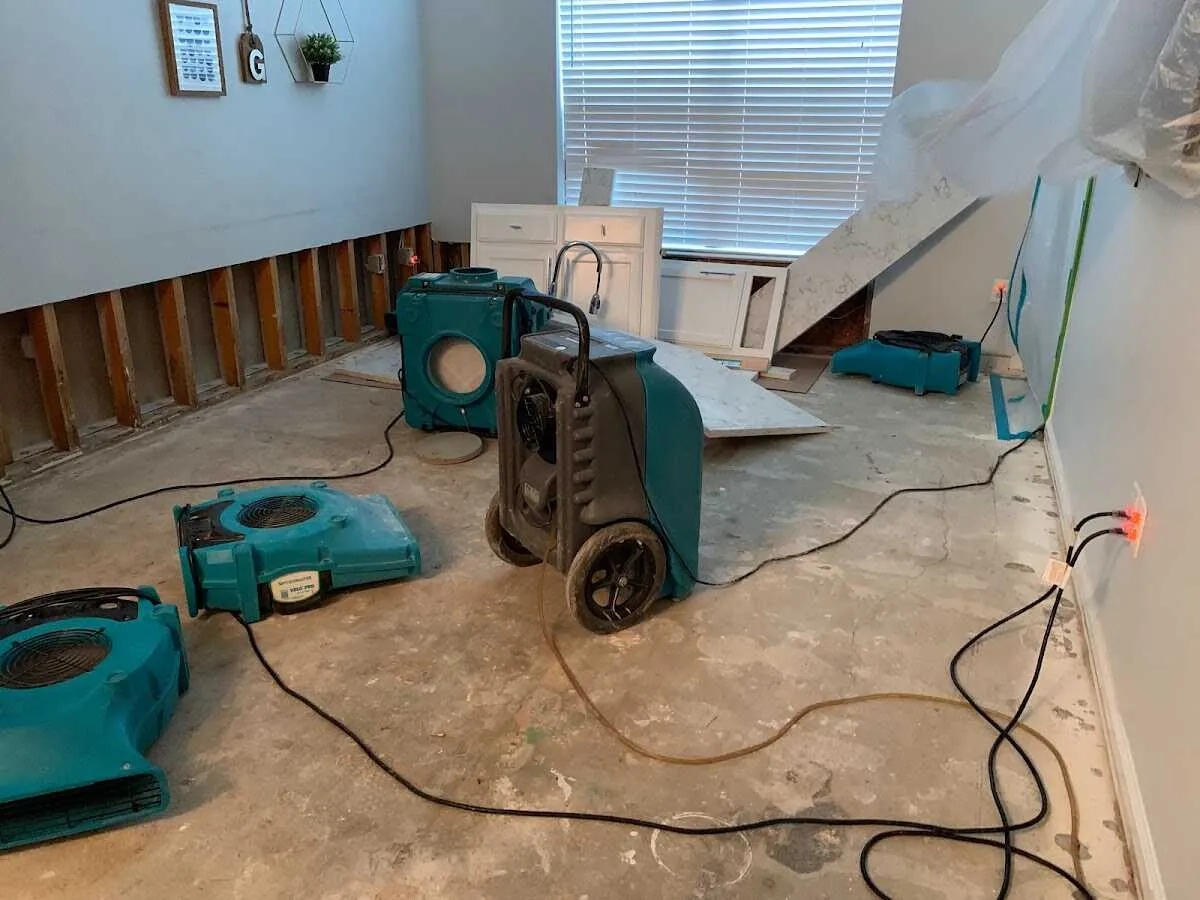 Dehumidifier in flood-cut room for Water Damage Restoration in Lynbrook