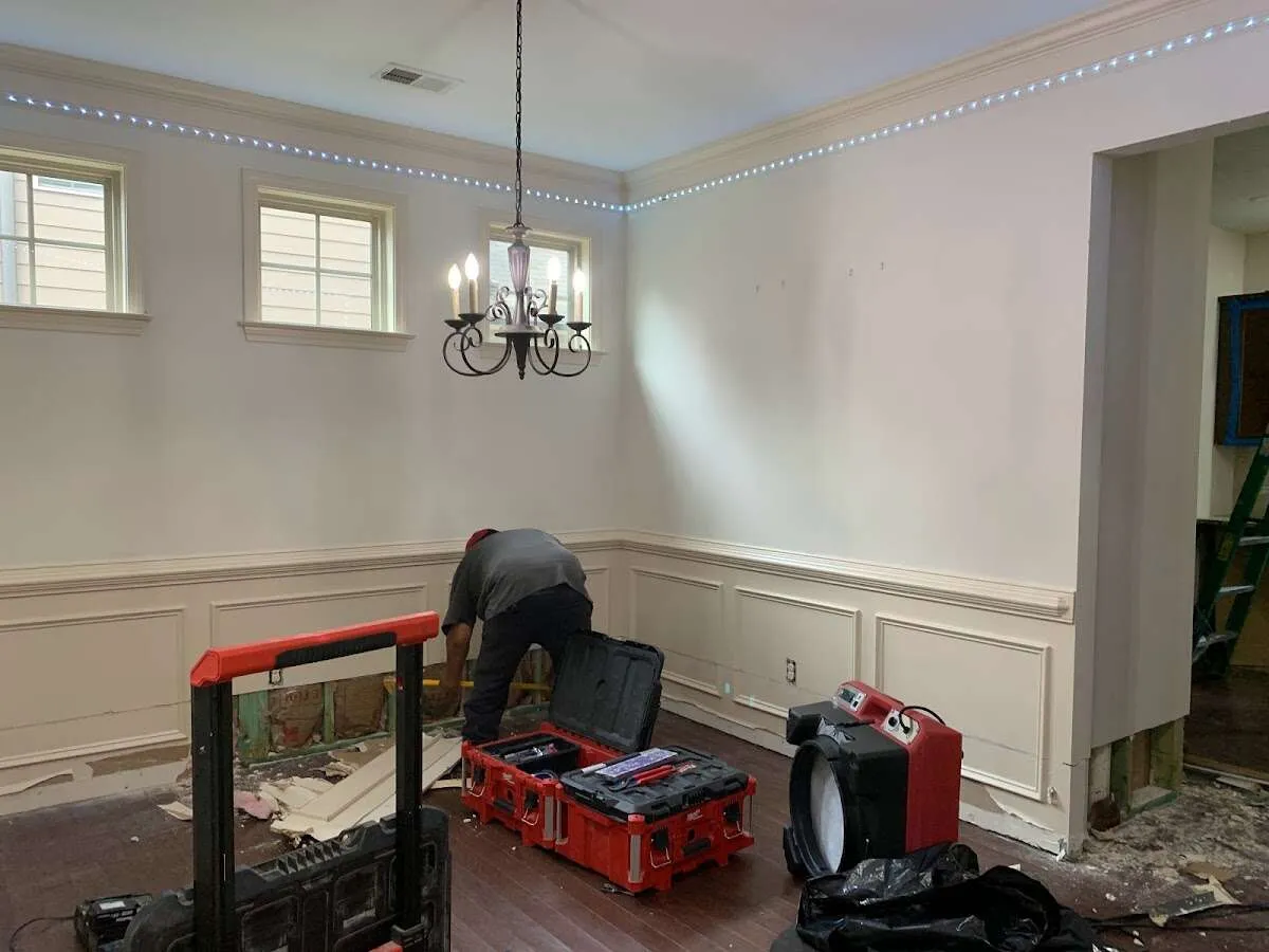Restoration technician with professional equipment in Lynbrook